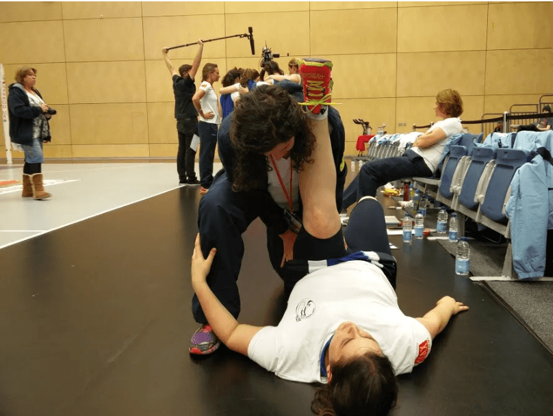 Assisted stretching with an athlete